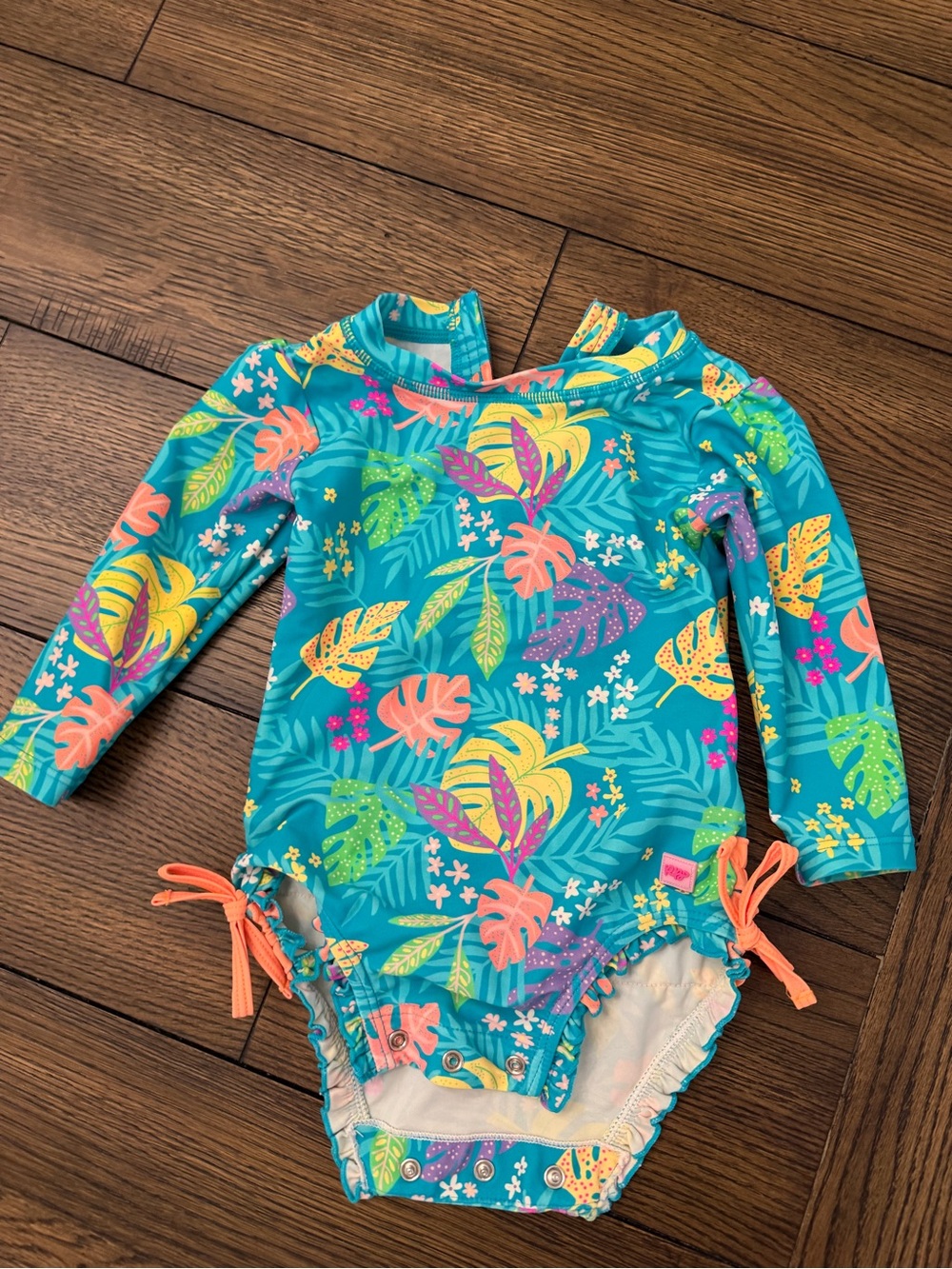 Ruffle Butts brand Kids Long Sleeve Tropical Print Swimsuit - Teal, like new
